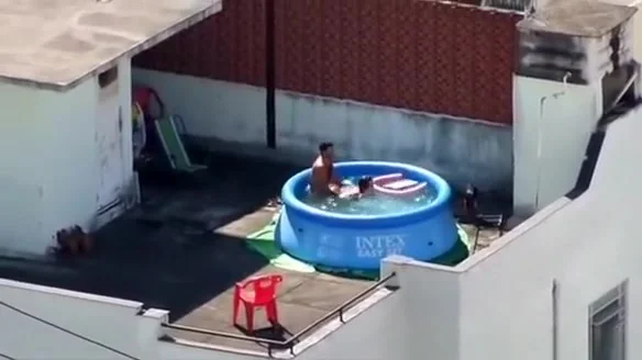 Man and woman fucking in the pool