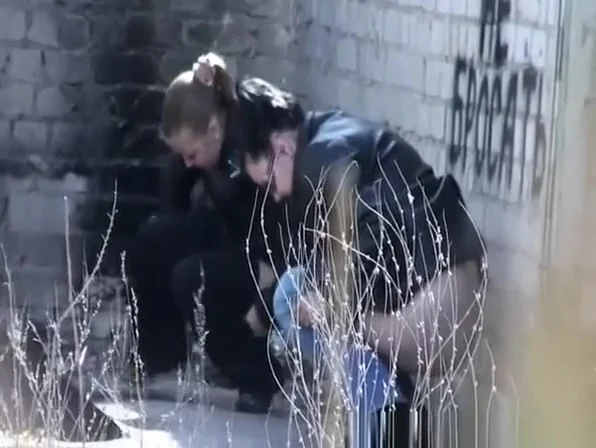 Girls peeing abandon place