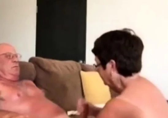 Girl giving husband a blow hand job