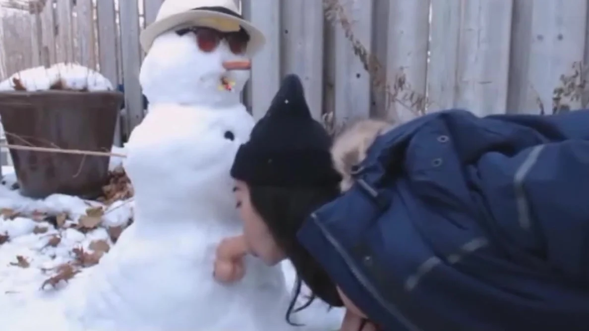 fuck snowman in the yard of house