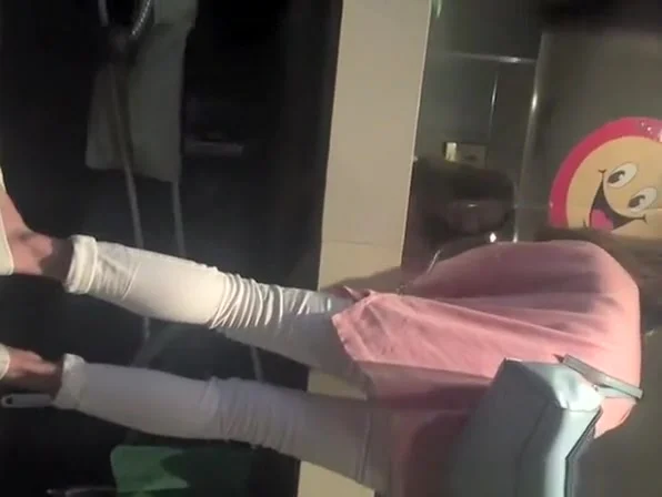 Asian woman spied in public toilet