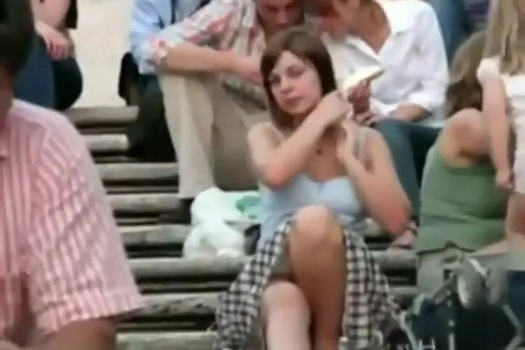 Checking her panties while she's sitting