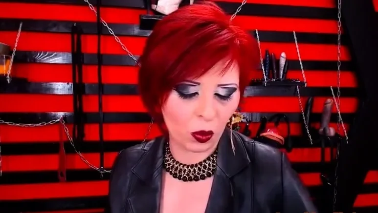 Seductive Red Head Dom Milf Smoking On Cam In Boots