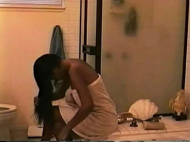 Vivian puts the sexy contours of her body on display in the shower