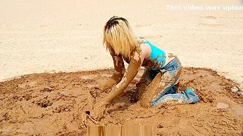 Muddy Girl in Jeans