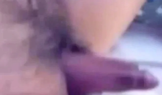 a woman pumps her clit into a dick