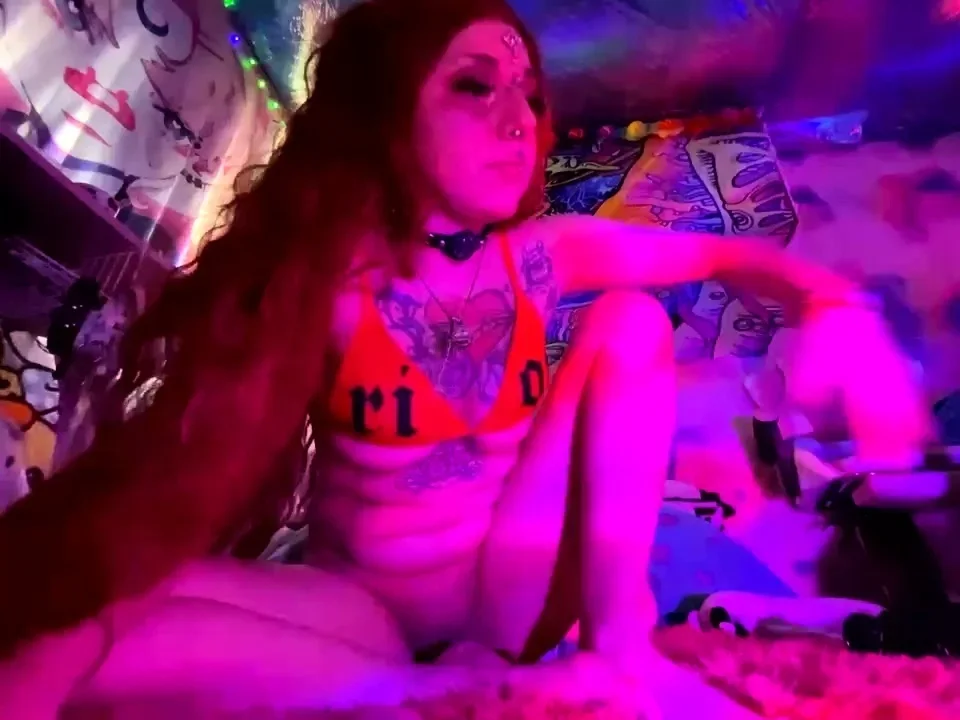 Sexy redhead teen strips and masturbates