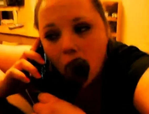 Cheating Wife on Phone With Husband While Sucking a BBC