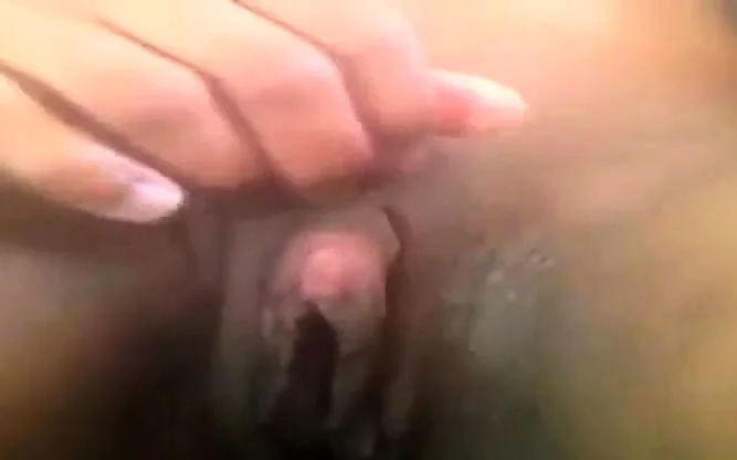 girl rubs her gigantic clit
