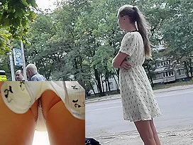 Awesome upskirt with pretty hussy with auburn hair