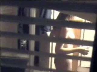 Window peeping - girl topless