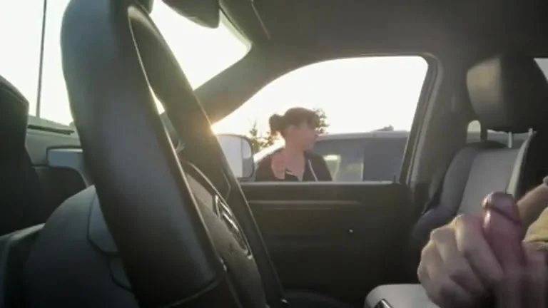 Parking lot woman smokes and watches him jerk off
