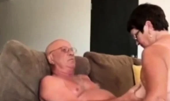 Girl giving husband a blow hand job