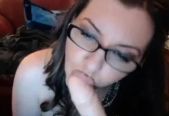 Nerdy Chick with glasses sucking dildo and masturbating