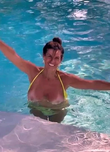 Busty curly brunette with big boobs fucks on couch