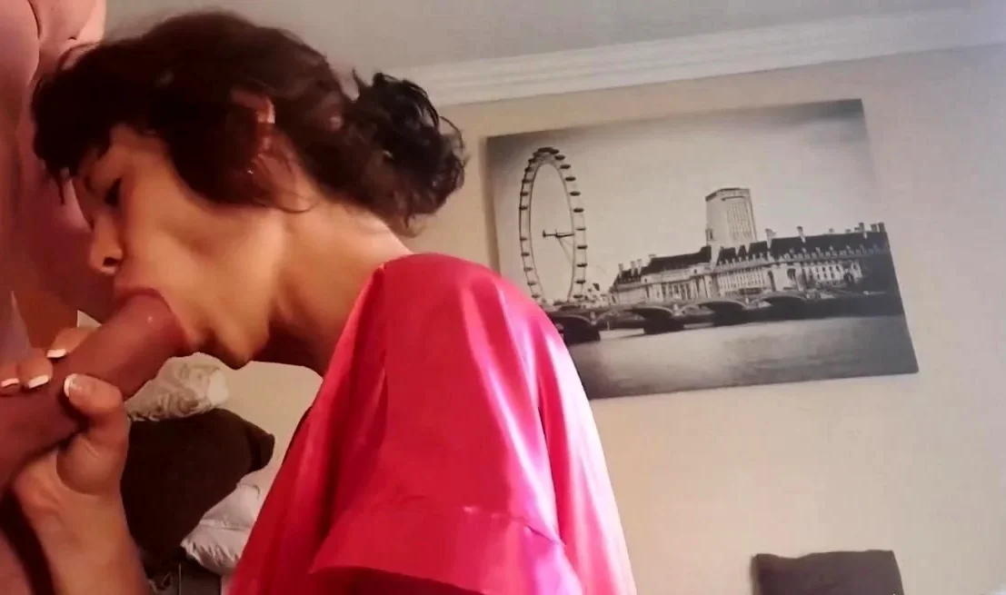 Curly haired milf sucking and jerking my cock till I cum