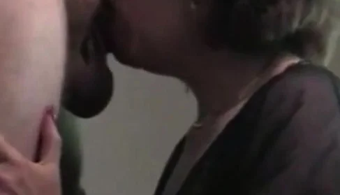 Busty grandma with glasses gives head and gets cum
