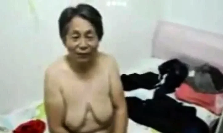 Asian Grandma get dressed after sex