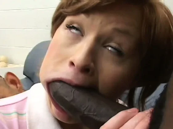 Pretty little redhead is almost too tight for these black dicks