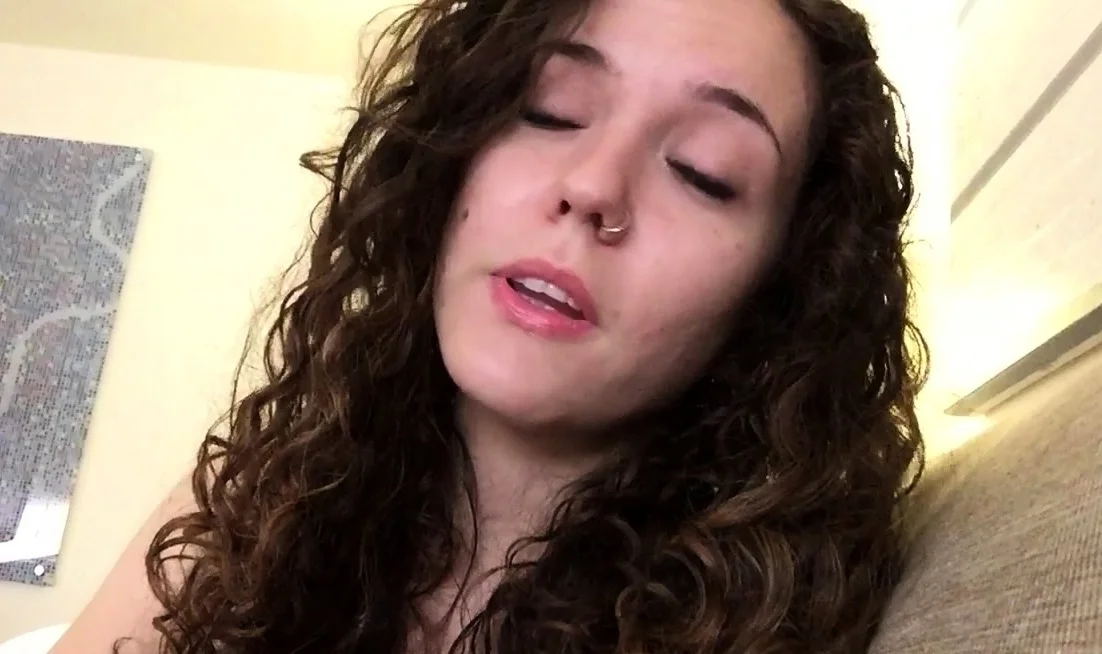 Busty curly brunette with big boobs fucks on couch