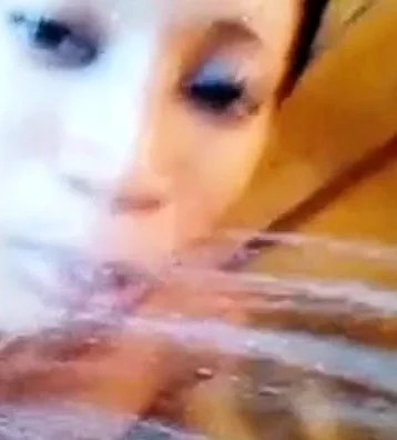 Hairy pussy 18-year-old ebony with salty clit takes a shower