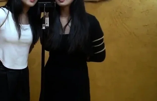 Four girls tied up singing