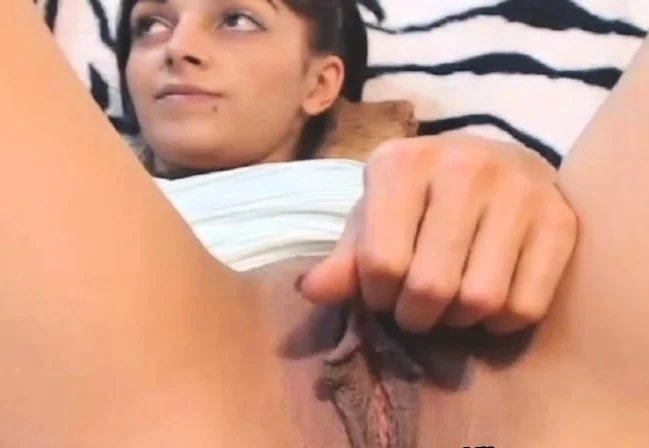 Naughty Chick masturbating and fingering herself