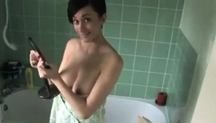 Kim's boobs slip out of her towel