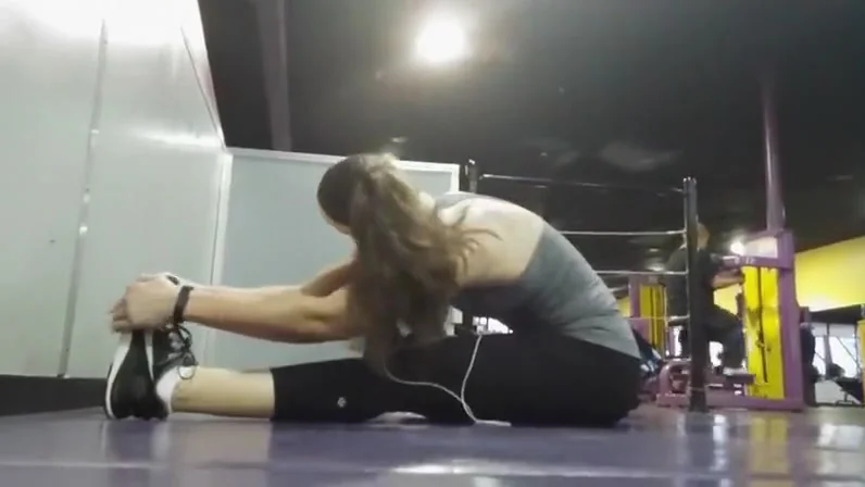 Flexible girl does her stretching