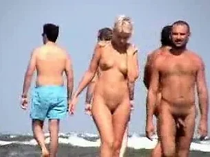 Public voyeur enjoys nude beach sex